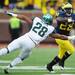 Michigan running back Fitzgerald Toussaint looks to run the ball around Michigan State linebacker Denicos Allen during the third quarter against Michigan State at Michigan Stadium on Saturday afternoon. Melanie Maxwell I AnnArbor.com
